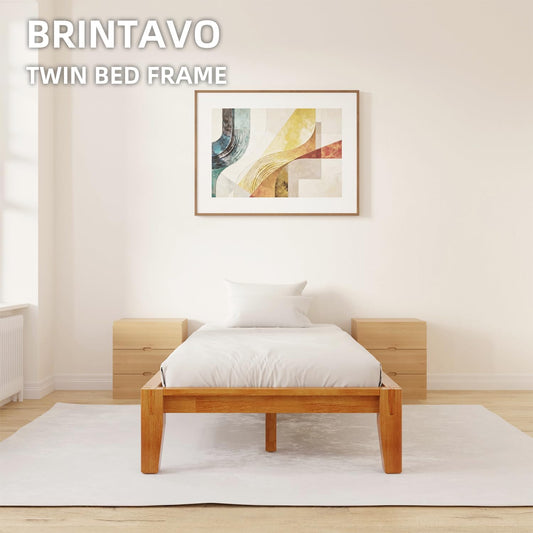 Brintavo Twin solid rubberwood platform bed frame in Walnut in a bright bedroom