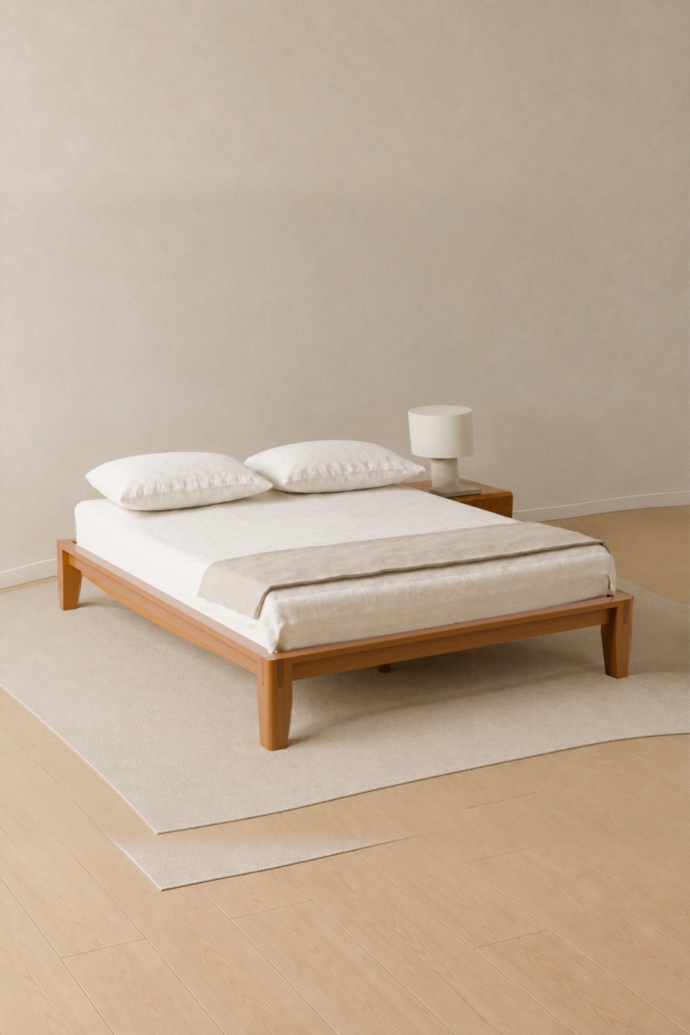 Complete Queen Brintavo bed frame in an extended warm bedroom